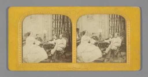 Married couple with two sons around a table