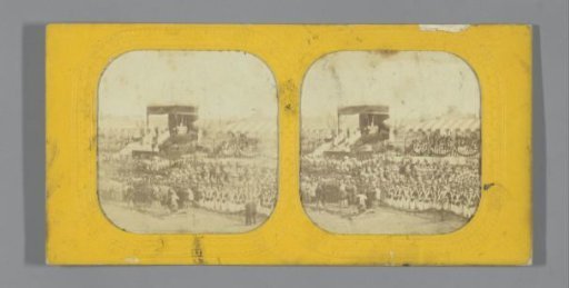 Audience around a canopy with an altar