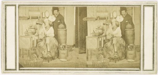 Scene in a kitchen depicting a woman drinking from a bottle and a man looking around the corner