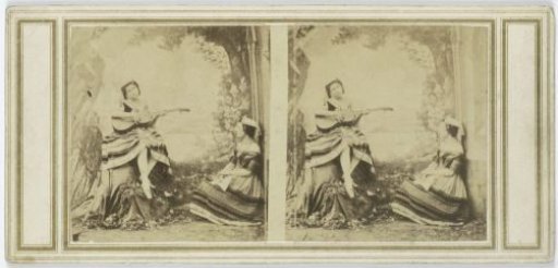 Woman with a guitar and another woman listening