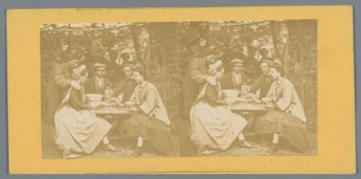 Company around a table in a garden
