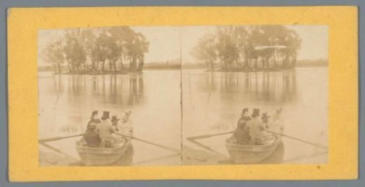 Company in a rowing boat on a lake