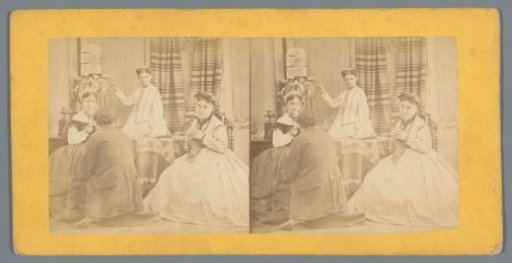 Three women and a seated man seen from behind