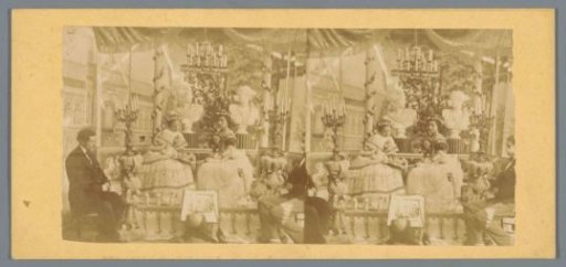 Two women with a conductor in the foreground
