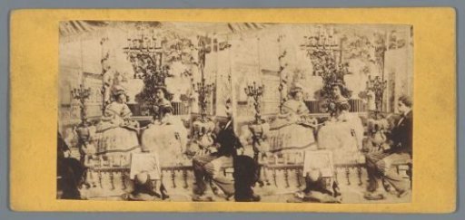 Two women with a conductor in the foreground