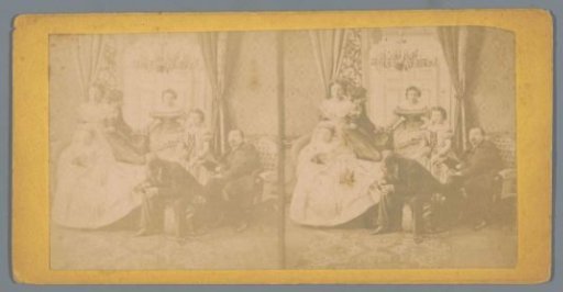 Bride and groom with retinue in a sitting room