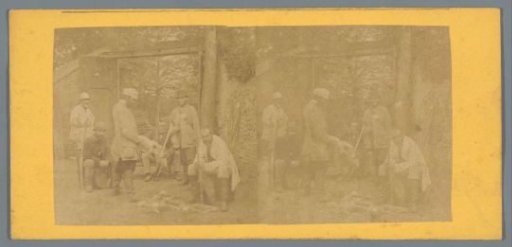 Hunters with their game before a gate