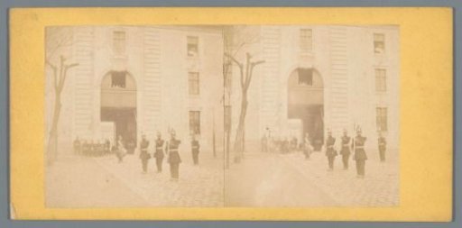 Soldiers exercising before a barracks