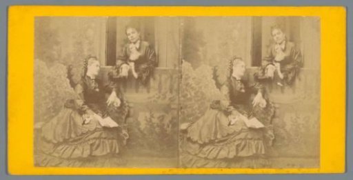 Woman sitting with an open book before a balcony where another woman is leaning