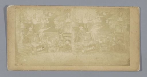 Staging of dolls in a set, representing a kitchen in hell