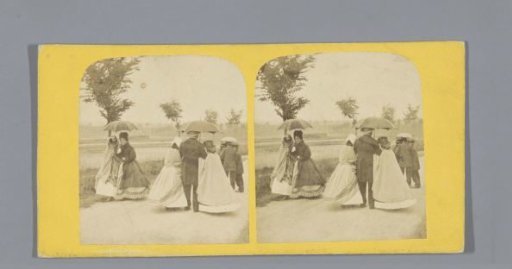 People walking under umbrellas