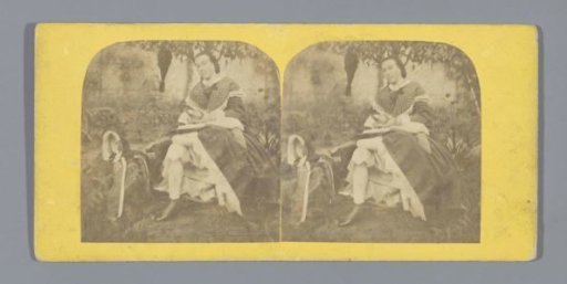 Woman peeling an apple under a tree