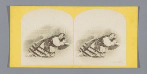 Kate Terry lying with a book