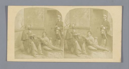 Theatrical representation of a monk and a prisoner at a dungeon with a guard in the background