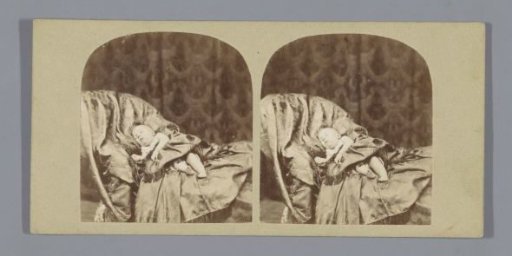 Portrait of an unknown sleeping infant on a chair