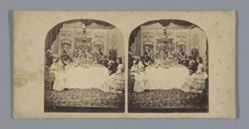 Company dining around a table
