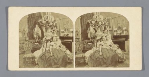 Three women on a round bench and a fourth woman on a bench in the background