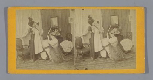 Two women trying on hats