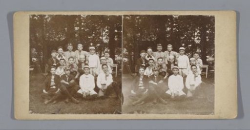 Portrait of a group of unknown boys in scout costume