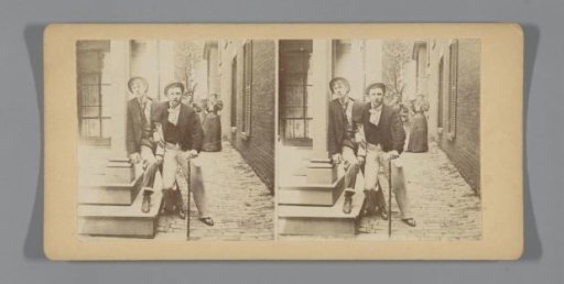 Two men in an alley with two women in the background