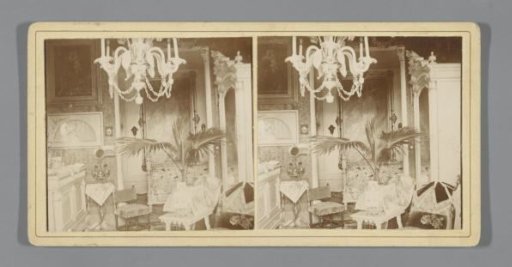 Interior of a living room around the turn of the century