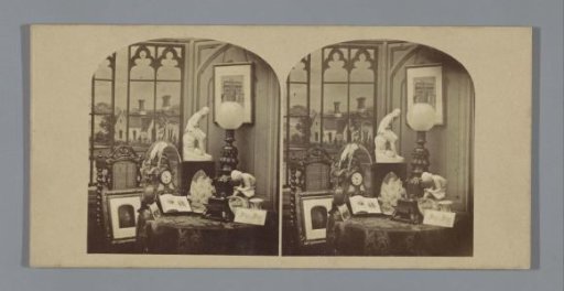 Still life with stereoscope and photographs