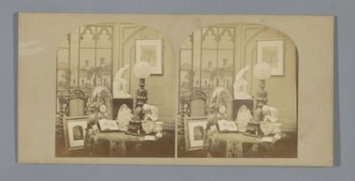 Still life with stereoscope and photographs