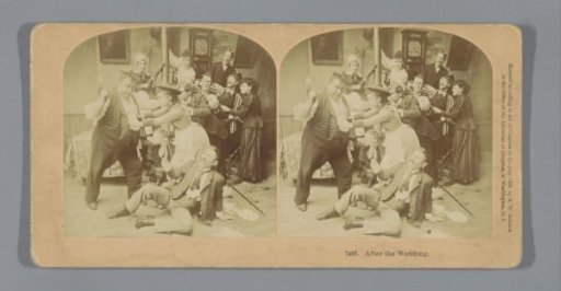 Woman between two quarreling men with onlookers