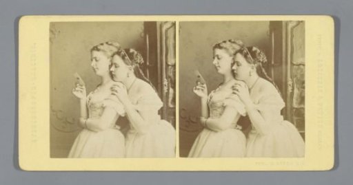 Two young women reading letters