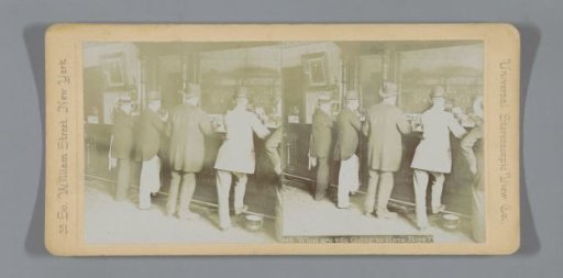 Four men and a woman at the bar, seen from behind