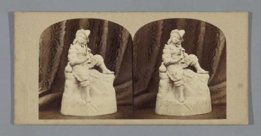 Sculpture of a music-making young man