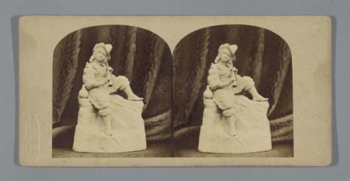 Sculpture of a music-making young man