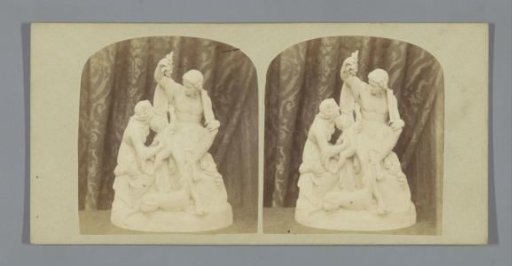 Sculpture of a man, woman and child