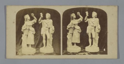 Sculpture of a woman and sculpture of a man in costume