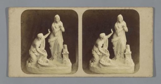 Sculpture of two women finding Moses in a basket