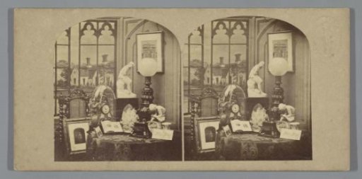 Still life with stereoscope and photographs
