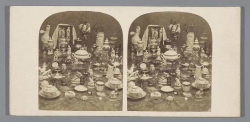Still life with tableware and sculptures