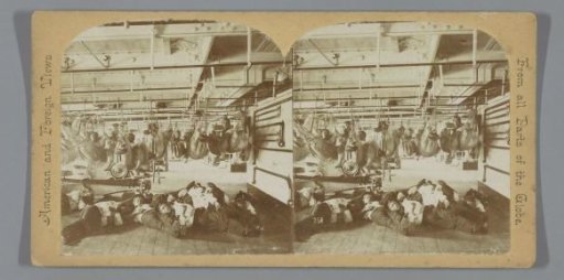 Sailors in hammocks on the tween deck of a ship