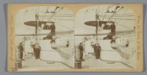 Sailors posing on the deck of a ship