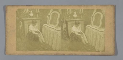 Scene in a boudoir: a woman putting on stockings