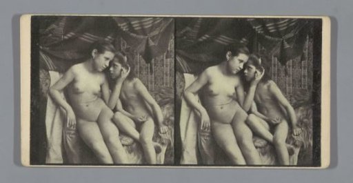 Scene with two nude girls on a sofa