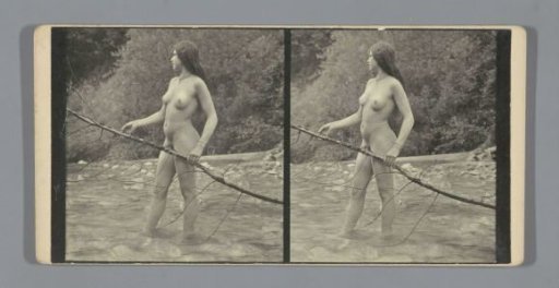 Portrait of a nude woman in a stream