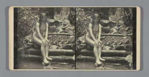 Portrait of a nude woman on the bank of a stream