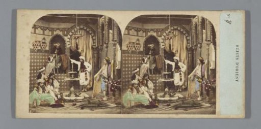 Oriental scene with a group of people around a fountain