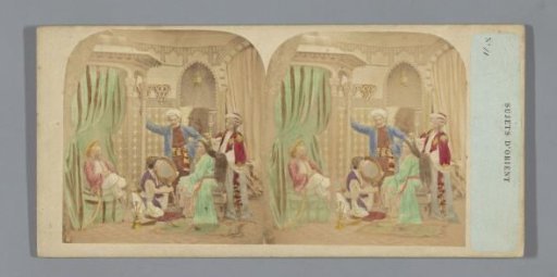 Oriental scene with a group of people around a mirror
