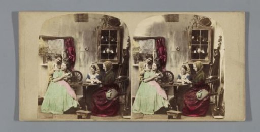 Family playing a card game