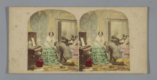 Man kneeling before a woman