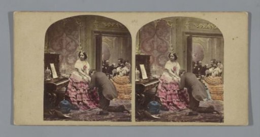 Man kneeling before a woman