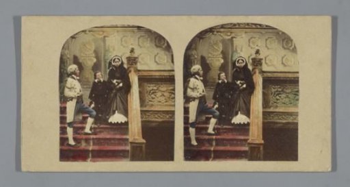Three people in a staircase