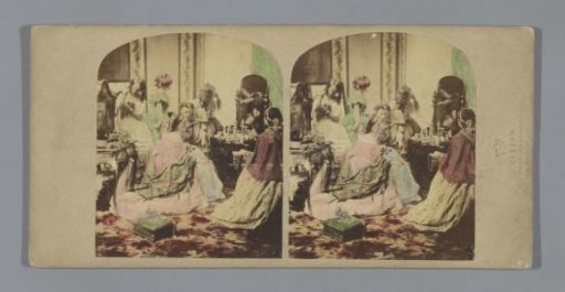 Six women around a dressing table